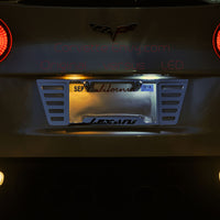 Original C6 License Plate Bulbs Installed versus LED